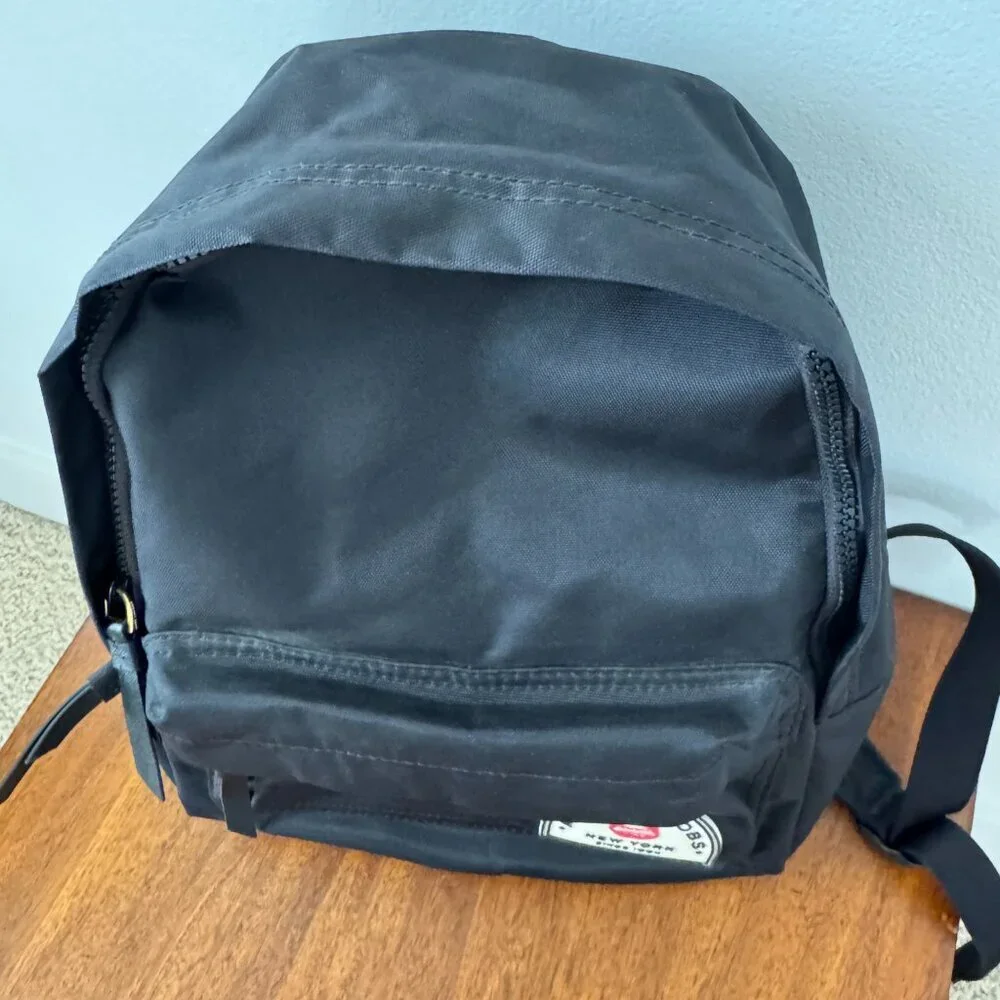 Marc Jacobs Black Backpack with Red Lip Logo Patch